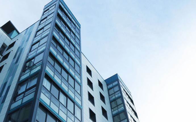 Low Angle View of Office Building Against Sky